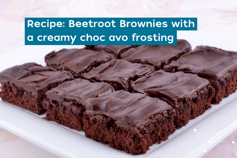 Chocolate brownies cut into 9 large pieces on a white plate