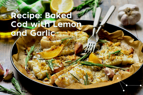 Fry pan with baking paper covering filled with fillets of cod with lemon, herbs and garlic